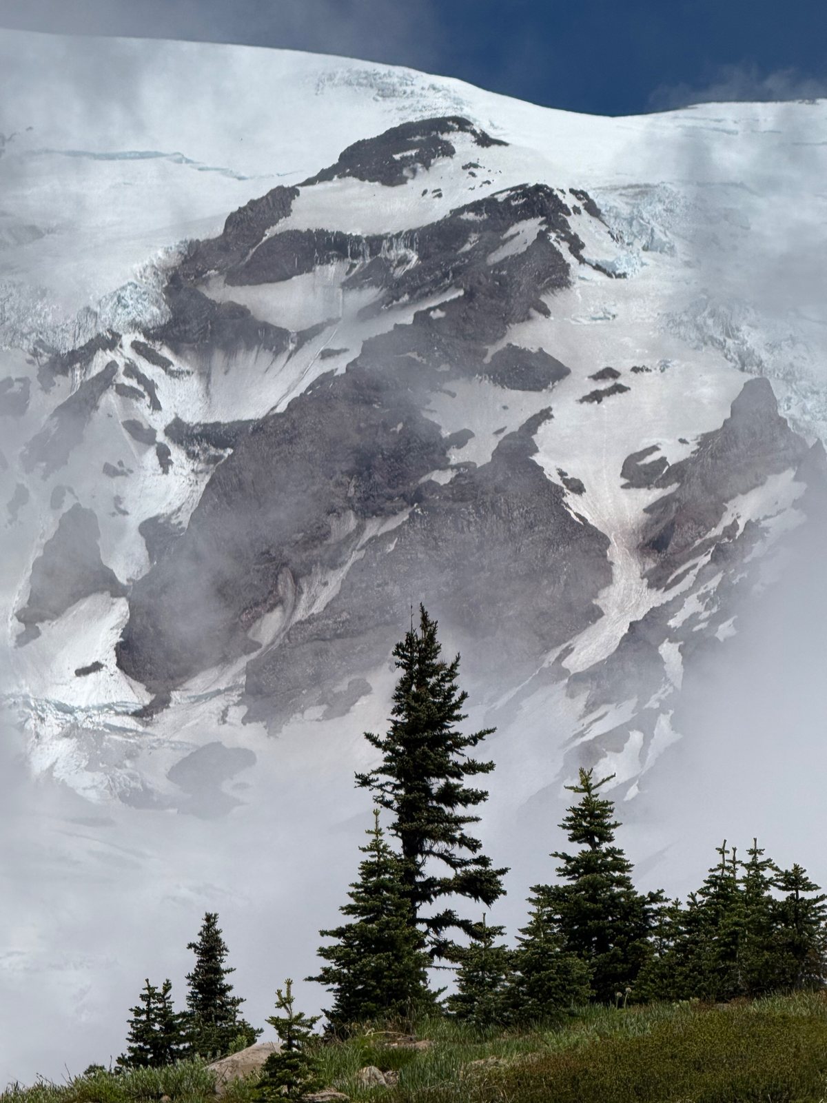 Summit under cloud